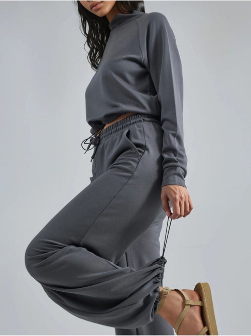 Ensemble deux pièces taille haute à col roulé et jambes larges hiccup - Kiabi Ensemble deux pièces taille haute à col roulé et jambes larges hiccup - Kiabi