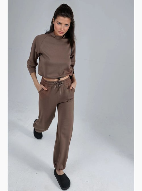 Ensemble deux pièces taille haute à col roulé et jambes larges hiccup - Kiabi Ensemble deux pièces taille haute à col roulé et jambes larges hiccup - Kiabi