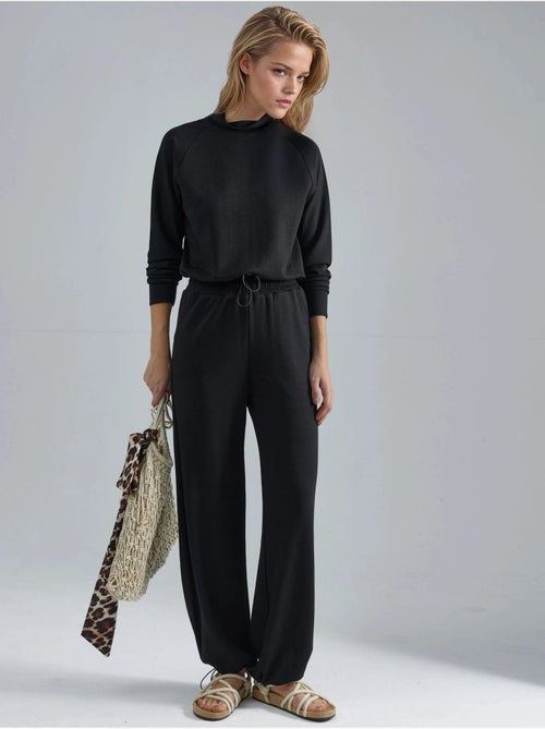Ensemble deux pièces taille haute à col roulé et jambes larges hiccup - Kiabi Ensemble deux pièces taille haute à col roulé et jambes larges hiccup - Kiabi