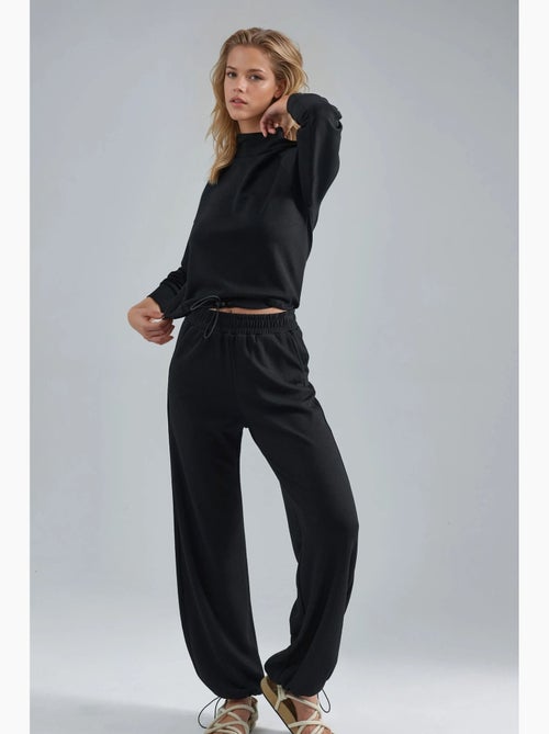 Ensemble deux pièces taille haute à col roulé et jambes larges hiccup - Kiabi Ensemble deux pièces taille haute à col roulé et jambes larges hiccup - Kiabi