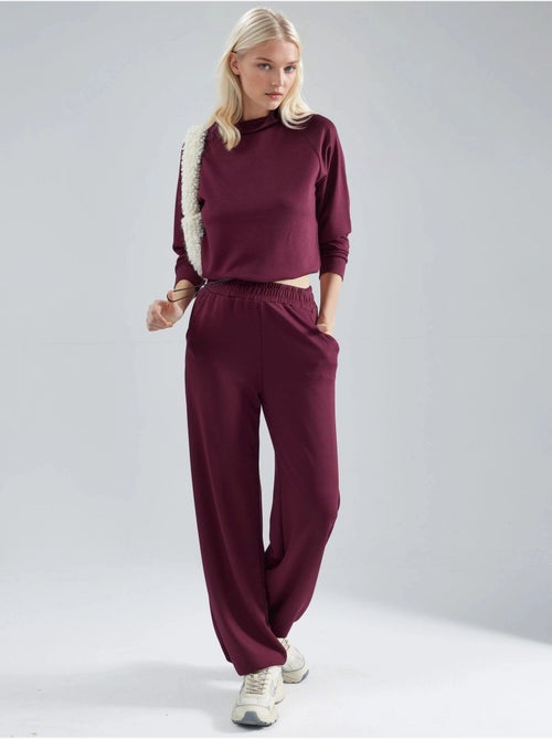 Ensemble deux pièces taille haute à col roulé et jambes larges hiccup - Kiabi Ensemble deux pièces taille haute à col roulé et jambes larges hiccup - Kiabi