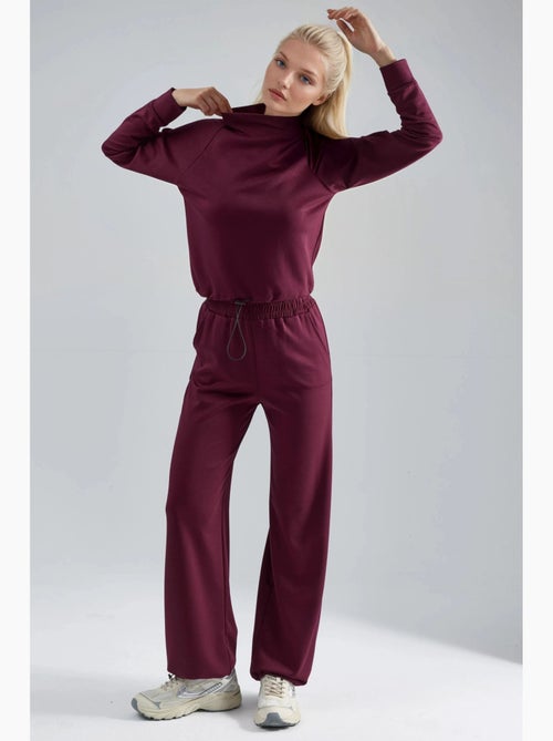 Ensemble deux pièces taille haute à col roulé et jambes larges hiccup - Kiabi Ensemble deux pièces taille haute à col roulé et jambes larges hiccup - Kiabi
