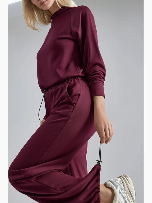 Ensemble deux pièces taille haute à col roulé et jambes larges hiccup - Kiabi Ensemble deux pièces taille haute à col roulé et jambes larges hiccup - Kiabi