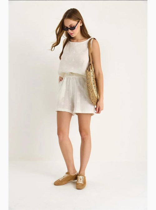 Ensemble deux pièces taille haute et short avec fermeture à boutons lucci - Kiabi Ensemble deux pièces taille haute et short avec fermeture à boutons lucci - Kiabi
