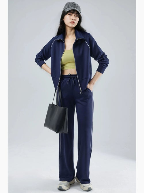 Ensemble deux pièces taille haute jambes larges avec col zippé hiccup - Kiabi Ensemble deux pièces taille haute jambes larges avec col zippé hiccup - Kiabi