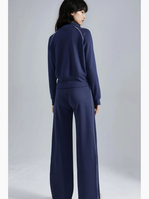 Ensemble deux pièces taille haute jambes larges avec col zippé hiccup - Kiabi Ensemble deux pièces taille haute jambes larges avec col zippé hiccup - Kiabi