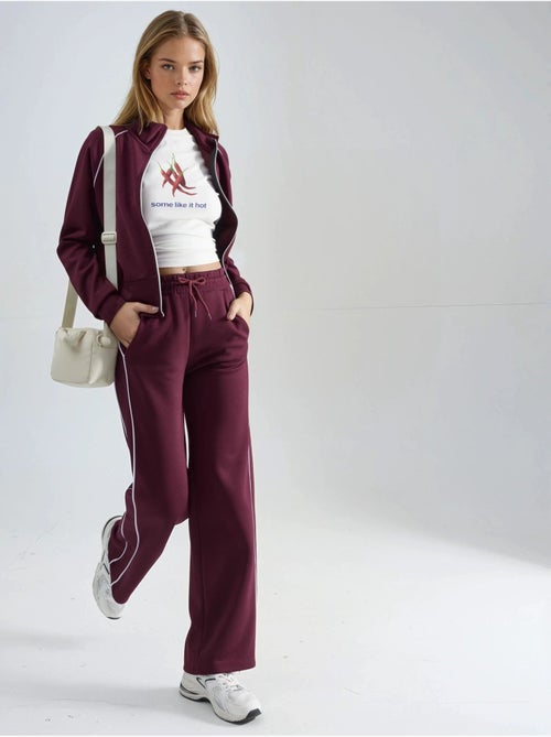 Ensemble deux pièces taille haute jambes larges avec col zippé hiccup - Kiabi Ensemble deux pièces taille haute jambes larges avec col zippé hiccup - Kiabi