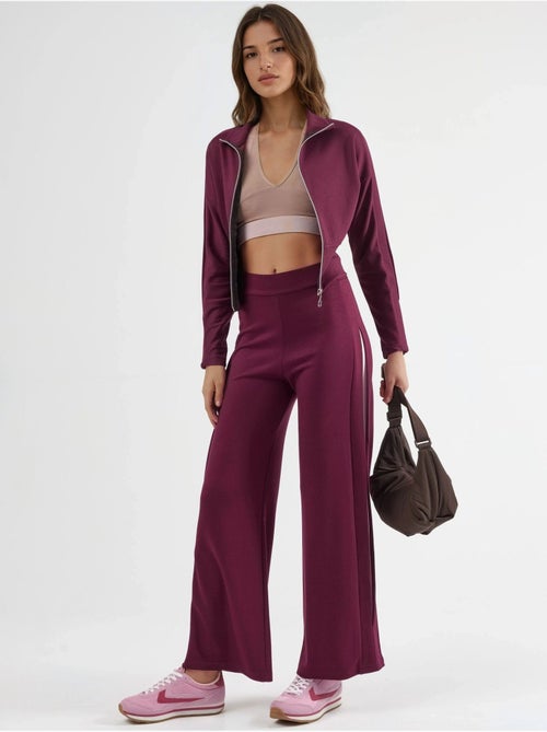 Ensemble deux pièces taille haute jambes larges avec col zippé - Kiabi Ensemble deux pièces taille haute jambes larges avec col zippé - Kiabi