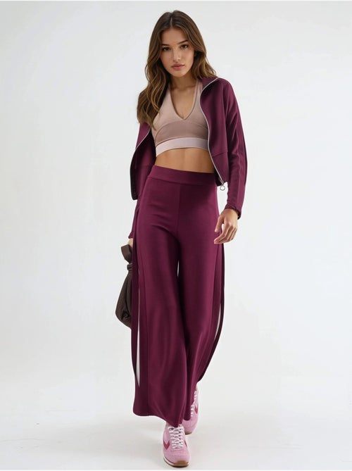 Ensemble deux pièces taille haute jambes larges avec col zippé - Kiabi Ensemble deux pièces taille haute jambes larges avec col zippé - Kiabi