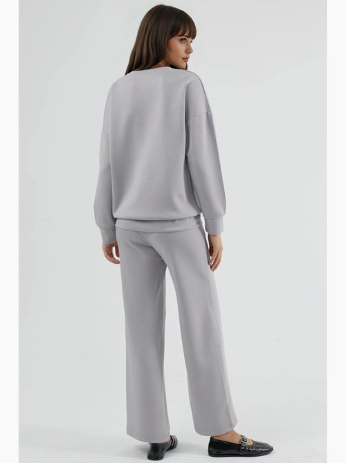 Ensemble deux pièces taille haute jambes larges hiccup - Kiabi Ensemble deux pièces taille haute jambes larges hiccup - Kiabi