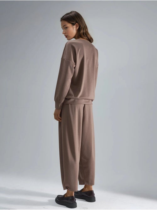 Ensemble deux pièces tricoté à col zippé et jambes larges hiccup - Kiabi Ensemble deux pièces tricoté à col zippé et jambes larges hiccup - Kiabi