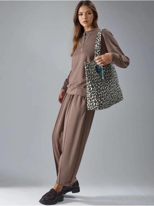 Ensemble deux pièces tricoté à col zippé et jambes larges hiccup - Kiabi Ensemble deux pièces tricoté à col zippé et jambes larges hiccup - Kiabi