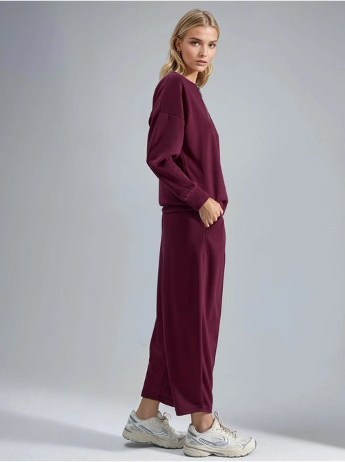 Ensemble deux pièces tricoté à col zippé et jambes larges hiccup - Kiabi Ensemble deux pièces tricoté à col zippé et jambes larges hiccup - Kiabi