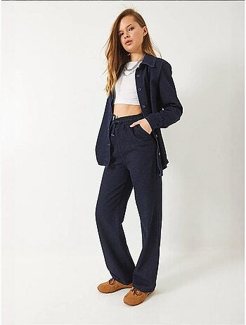 Ensemble en jean avec chemise ceinturée à épaulettes et pantalon palazzo bianco lucci