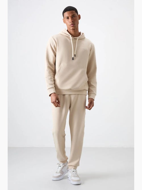 Ensemble homme sweat à capuche et pantalon tommy - Kiabi Ensemble homme sweat à capuche et pantalon tommy - Kiabi
