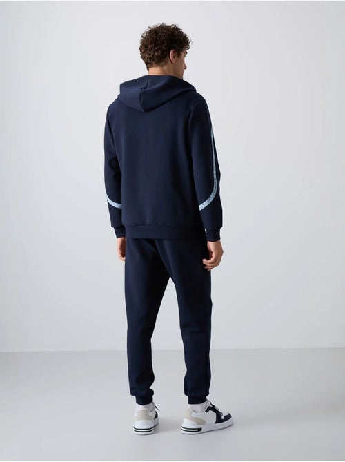 Ensemble homme sweat à capuche et pantalon tommy - Kiabi Ensemble homme sweat à capuche et pantalon tommy - Kiabi