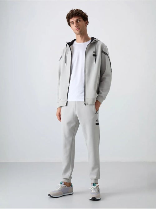 Ensemble homme sweat à capuche et pantalon tommy - Kiabi Ensemble homme sweat à capuche et pantalon tommy - Kiabi
