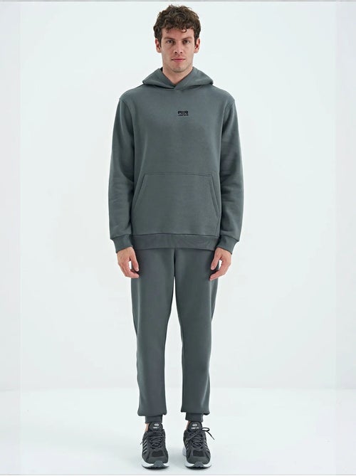 Ensemble homme sweat à capuche et pantalon tommy - Kiabi Ensemble homme sweat à capuche et pantalon tommy - Kiabi