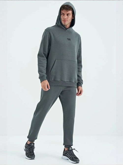 Ensemble homme sweat à capuche et pantalon tommy - Kiabi Ensemble homme sweat à capuche et pantalon tommy - Kiabi