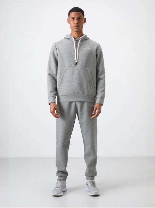 Ensemble homme sweat à capuche et pantalon tommy - Kiabi Ensemble homme sweat à capuche et pantalon tommy - Kiabi