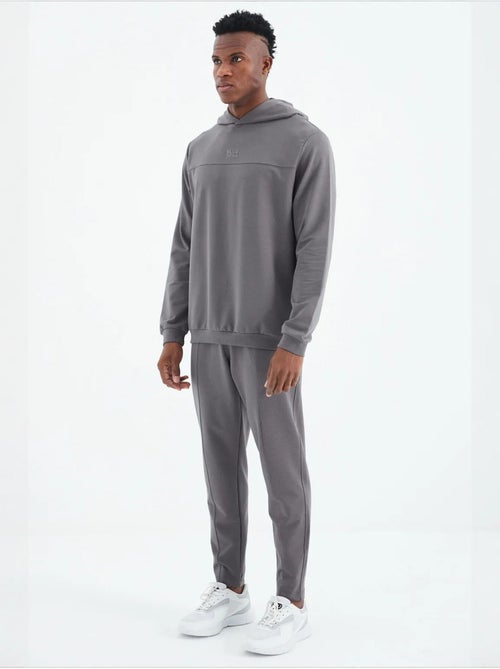 Ensemble homme sweat à capuche et pantalon tommy - Kiabi Ensemble homme sweat à capuche et pantalon tommy - Kiabi
