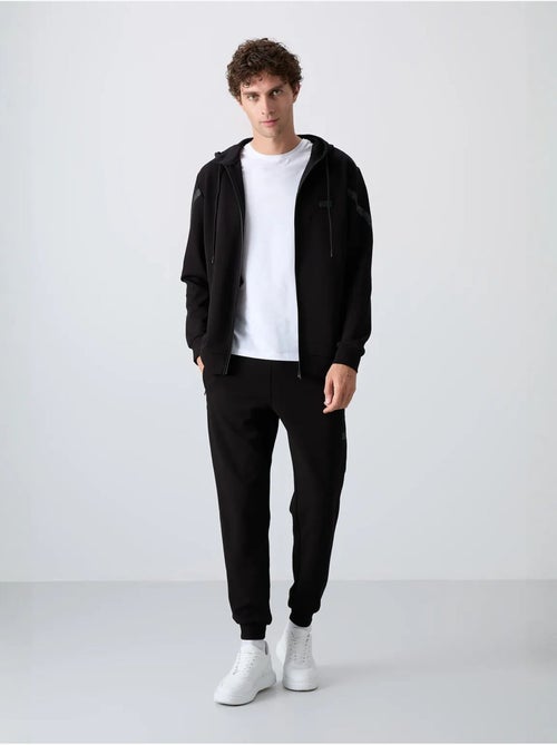 Ensemble homme sweat à capuche et pantalon tommy - Kiabi Ensemble homme sweat à capuche et pantalon tommy - Kiabi