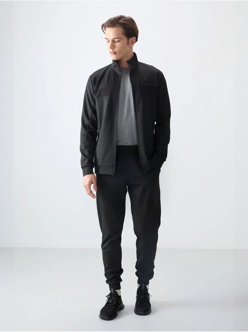 Ensemble homme sweat et pantalon à blocs de couleur tommy - Kiabi Ensemble homme sweat et pantalon à blocs de couleur tommy - Kiabi
