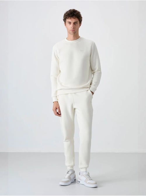 Ensemble homme sweat et pantalon à col rond manches longues tommy - Kiabi Ensemble homme sweat et pantalon à col rond manches longues tommy - Kiabi
