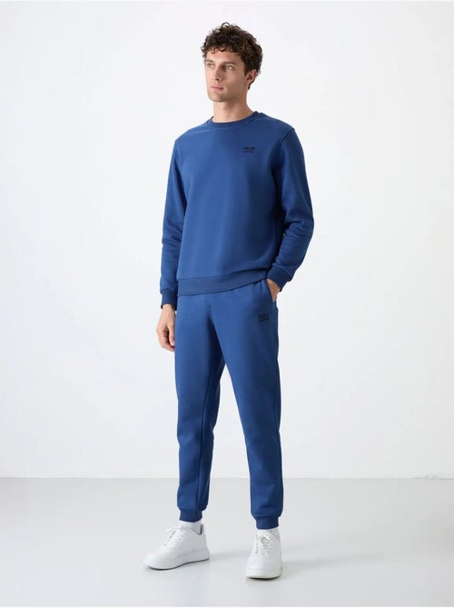 Ensemble homme sweat et pantalon à col rond manches longues tommy - Kiabi Ensemble homme sweat et pantalon à col rond manches longues tommy - Kiabi