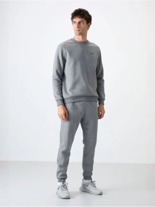 Ensemble homme sweat et pantalon à col rond manches longues tommy - Kiabi Ensemble homme sweat et pantalon à col rond manches longues tommy - Kiabi