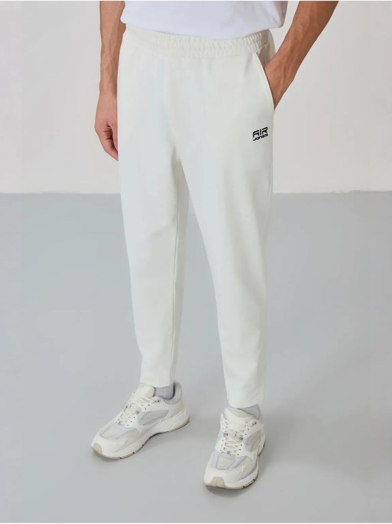Ensemble homme sweat et pantalon à col zippé tommy Blanc cassé - Kiabi