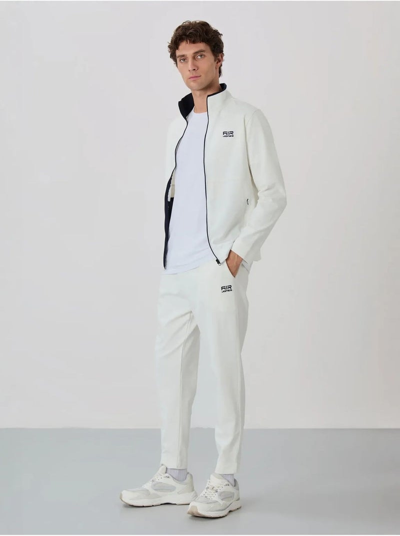 Ensemble homme sweat et pantalon à col zippé tommy Blanc cassé - Kiabi