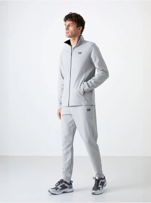 Ensemble homme sweat et pantalon à col zippé tommy - Kiabi Ensemble homme sweat et pantalon à col zippé tommy - Kiabi