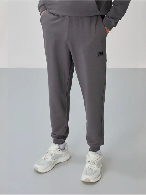 Ensemble homme sweat et pantalon à fermeture éclair tommy - Kiabi Ensemble homme sweat et pantalon à fermeture éclair tommy - Kiabi