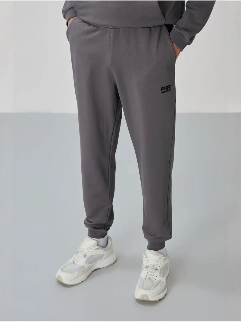 Ensemble homme sweat et pantalon à fermeture éclair tommy Gris Noir - Kiabi
