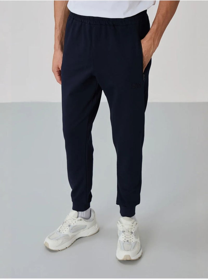 Ensemble homme sweat et pantalon en molleton tommy Bleu marine - Kiabi