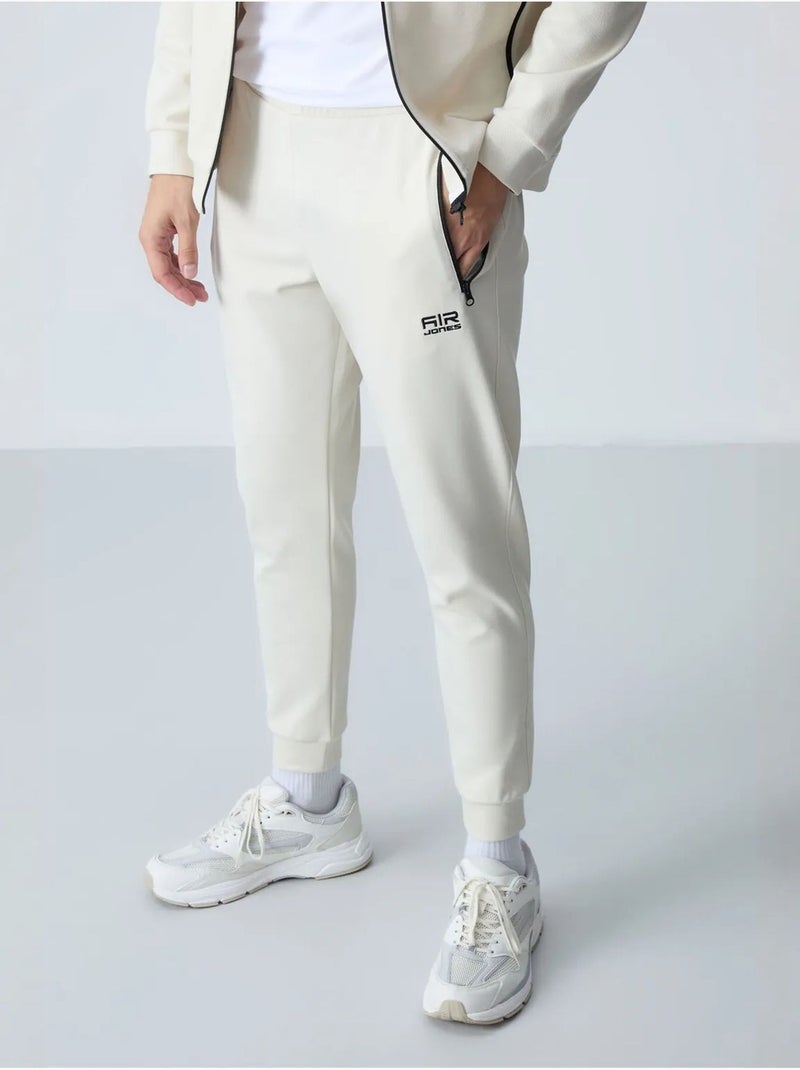 Ensemble homme sweat et pantalon en molleton tommy Crème - Kiabi