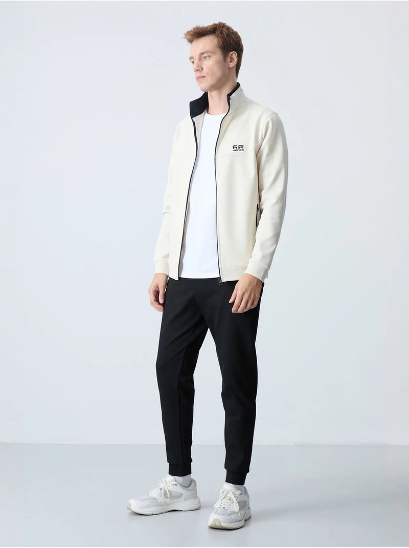 Ensemble homme sweat et pantalon en molleton tommy Ivoire - Kiabi