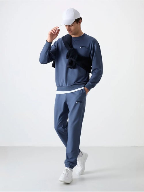 Ensemble homme sweat et pantalon oversize tommy - Kiabi Ensemble homme sweat et pantalon oversize tommy - Kiabi
