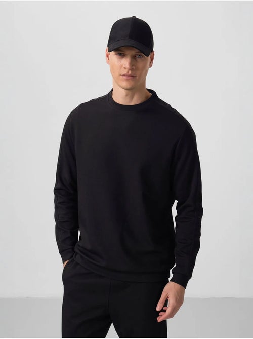Ensemble homme sweat et pantalon oversize tommy - Kiabi Ensemble homme sweat et pantalon oversize tommy - Kiabi