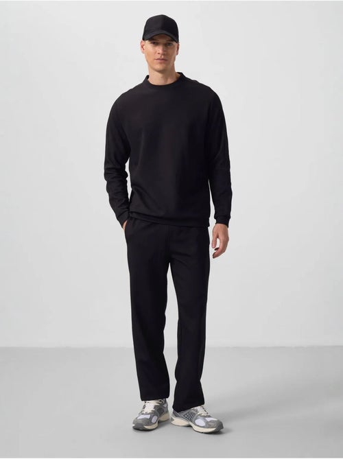 Ensemble homme sweat et pantalon oversize tommy - Kiabi Ensemble homme sweat et pantalon oversize tommy - Kiabi