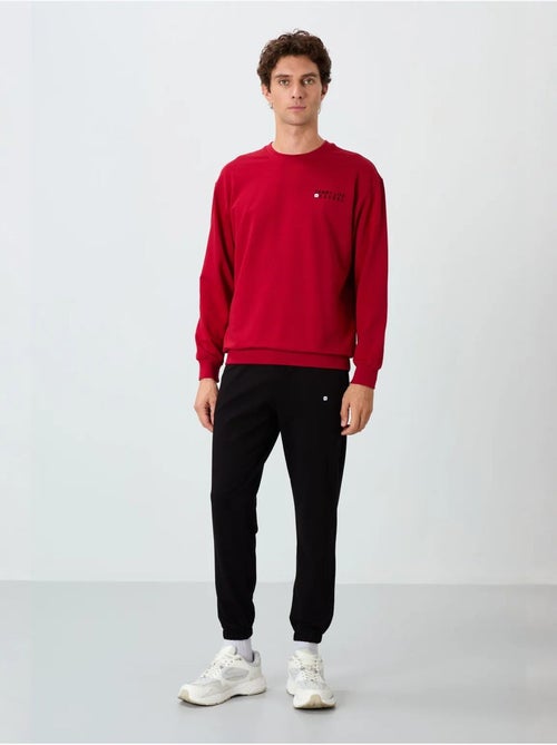 Ensemble homme sweat et pantalon oversize tommy - Kiabi Ensemble homme sweat et pantalon oversize tommy - Kiabi