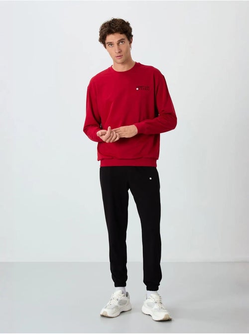 Ensemble homme sweat et pantalon oversize tommy - Kiabi Ensemble homme sweat et pantalon oversize tommy - Kiabi