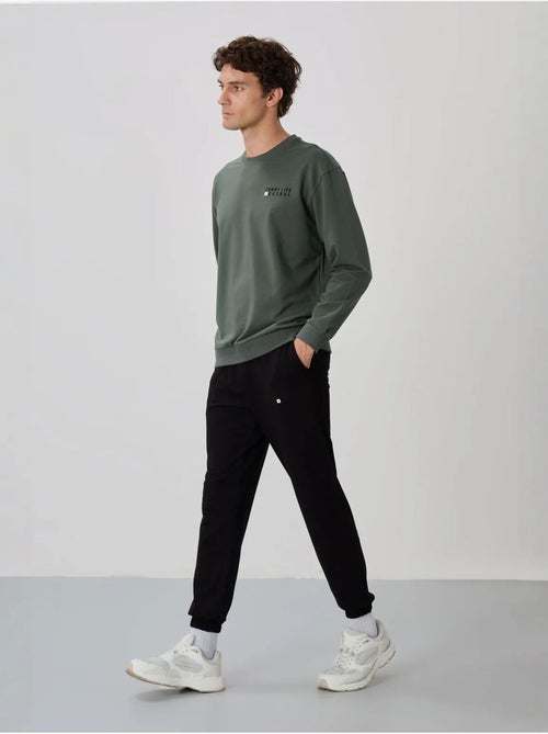 Ensemble homme sweat et pantalon oversize tommy - Kiabi Ensemble homme sweat et pantalon oversize tommy - Kiabi