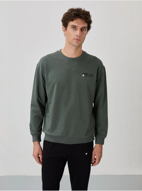 Ensemble homme sweat et pantalon oversize tommy - Kiabi Ensemble homme sweat et pantalon oversize tommy - Kiabi