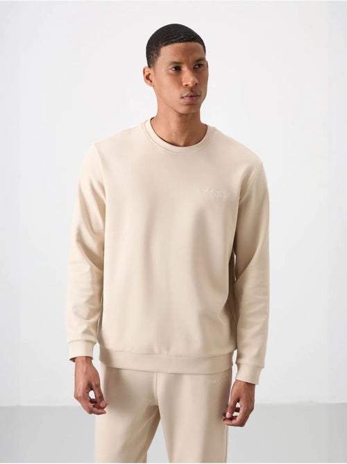 Ensemble homme sweat-shirt et pantalon à manches longues tommy - Kiabi Ensemble homme sweat-shirt et pantalon à manches longues tommy - Kiabi