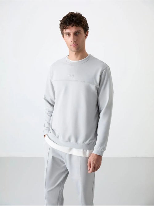 Ensemble homme sweat-shirt et pantalon en molleton tommy - Kiabi Ensemble homme sweat-shirt et pantalon en molleton tommy - Kiabi