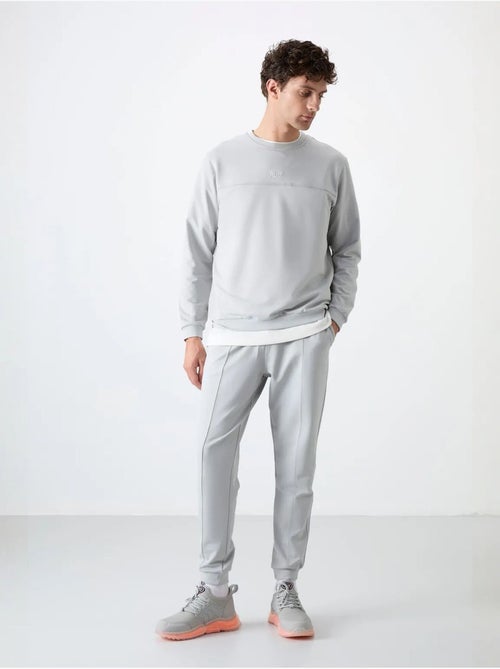 Ensemble homme sweat-shirt et pantalon en molleton tommy - Kiabi Ensemble homme sweat-shirt et pantalon en molleton tommy - Kiabi