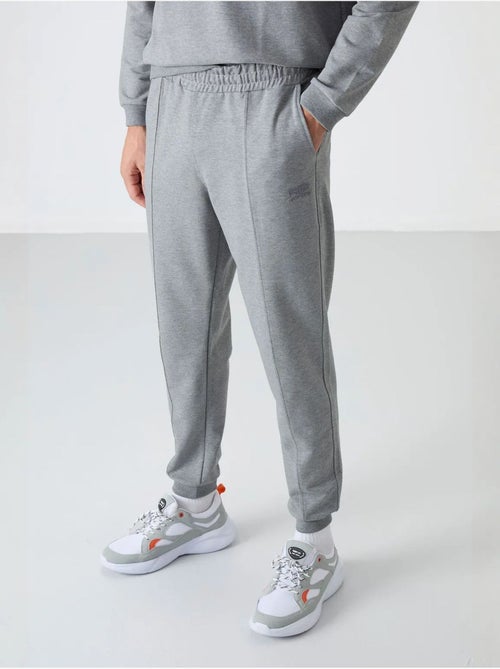 Ensemble homme sweat-shirt et pantalon en molleton tommy - Kiabi Ensemble homme sweat-shirt et pantalon en molleton tommy - Kiabi