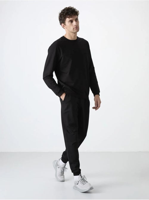 Ensemble homme sweat-shirt et pantalon en molleton tommy - Kiabi Ensemble homme sweat-shirt et pantalon en molleton tommy - Kiabi